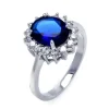 BAGUE EN ARGENT RHODIÉ SERTIE DE CUBIQUES ZIRCONIAS BLEU ET DE BLANCS