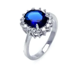 BAGUE EN ARGENT RHODIÉ SERTIE DE CUBIQUES ZIRCONIAS BLEU ET DE BLANCS