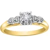 BAGUE EN OR 10K SERTIE DpiUN DIAMANT CANADIEN ET DE DIAMANTS