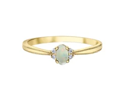 BAGUE EN OR SERTIE DpiUNE PIERRE DE COULEUR VARIÉE ET DE DIAMANTS