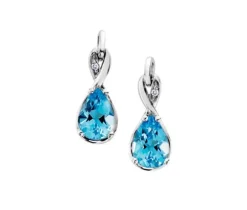BOUCLES EN OR BLANC SERTIES DE TOPAZES BLEUS ET DE DIAMANTS