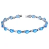 BRACELET EN ARGENT RHODIÉ SERTI DE TOPAZES BLEUS