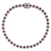 BRACELET TENNIS MARTINI EN OR BLANC SERTI DE RUBIS, ÉMERAUDES OU SAPHIRS ET DIAMANTS