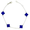 BRACELET TRÈFLES EN OR JAUNE SERTI DE LAPIS, DE NACRE OU DpiONYX