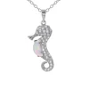 COLLIER HYPPOCAMPE EN ARGENT RHODIÉ SERTI DpiUNE OPALE BLEU OU BLANCHE SYNTHÉTIQUE ET DE CUBIQUES ZIRCONIAS