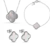 KIT COLLIER, BRACELET ET BOUCLES TRÈFLE EN ARGENT RHODIÉ SERTI DE NACRE DE PERLE