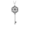 PENDENTIF CLÉ EN OR 10K BLANC SERTI DE DIAMANTS BLANCS ET NOIRS
