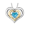 PENDENTIF EN ARGENT ET EN OR 10K SERTI DpiUN TOPAZE BLEU DANSANT ET DpiUN DIAMANT