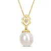 PENDENTIF EN OR JAUNE SERTI DpiUN DIAMANT ET DpiUNE PERLE DpiEAU DOUCE