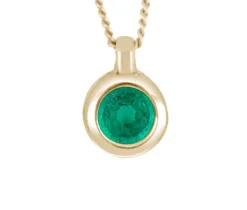 PENDENTIF EN OR 10K SERTI DpiUNE ÉMERAUDE