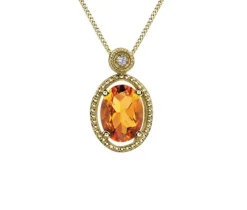 PENDENTIF EN OR SERTI DpiUNE CITRINE ET DpiUN DIAMANT