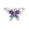PENDENTIF PAPILLON EN OR BLANC SERTI DpiAMÉTHYSTES DE TOPAZE BLEUS ET DE DIAMANTS